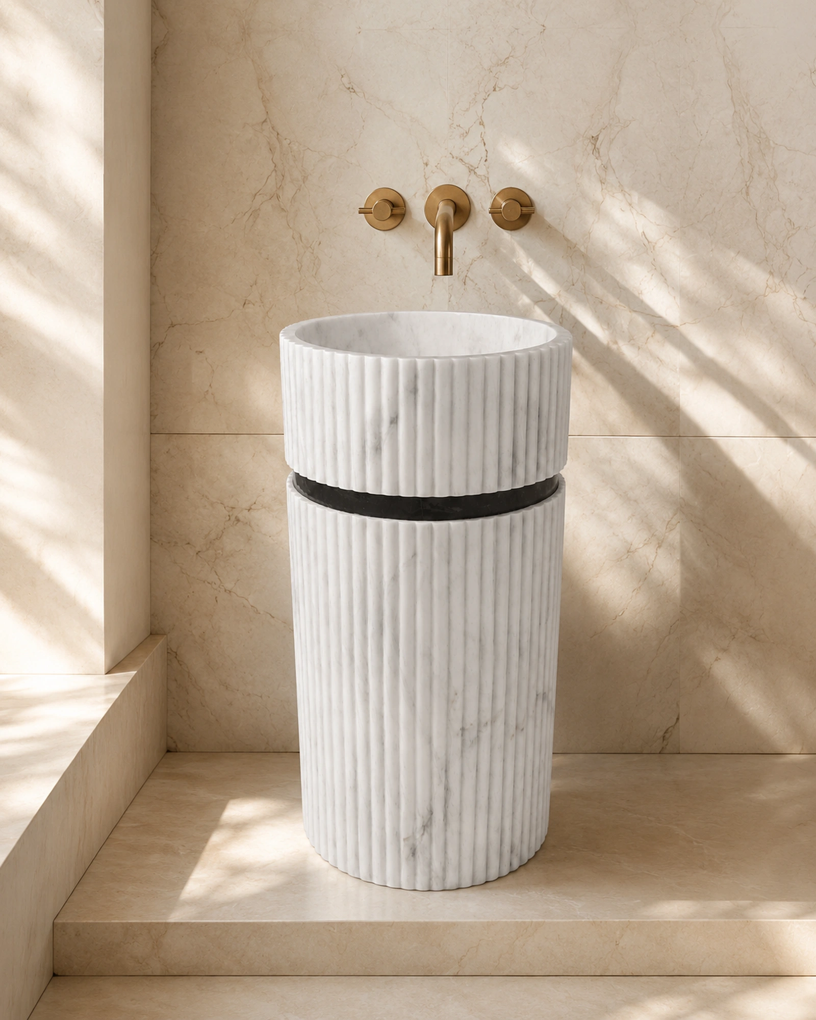Fluted freestanding natural stone basin in a warm bathroom setting