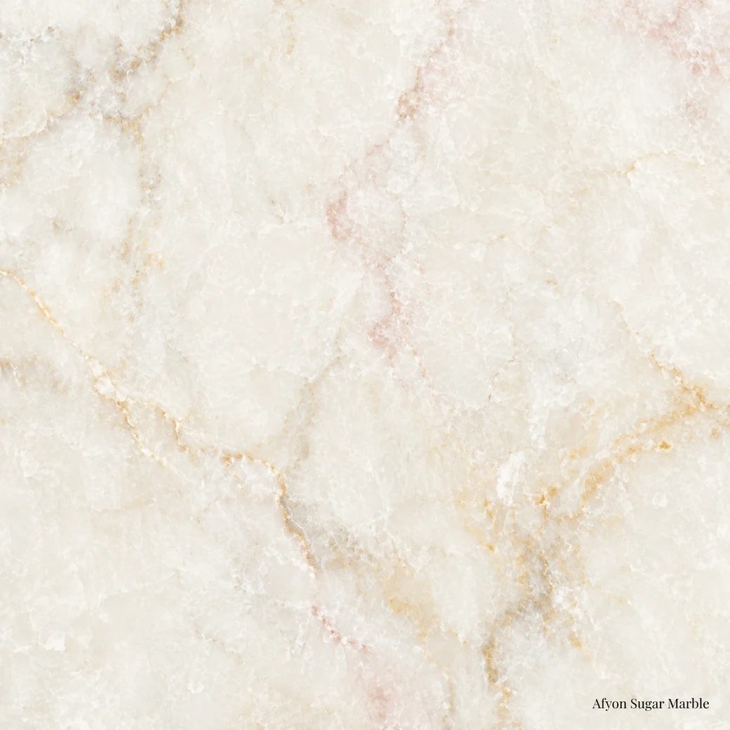 Afyon Sugar Marble slab featuring sugar textured white marble, creamy ivory tones, fine golden veins and a polished finish.