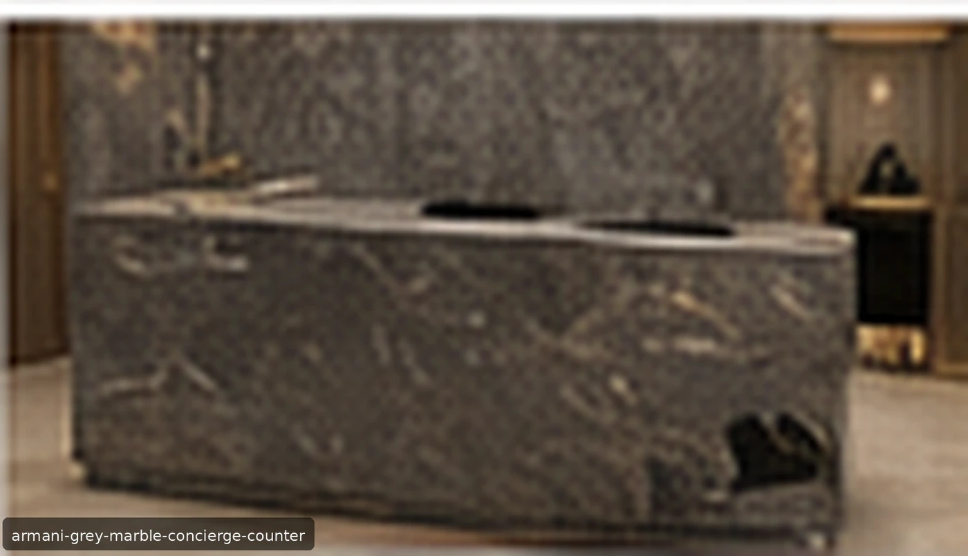Armani Grey Marble concierge counter with honed smoky-grey stone and refined white and silver veining.