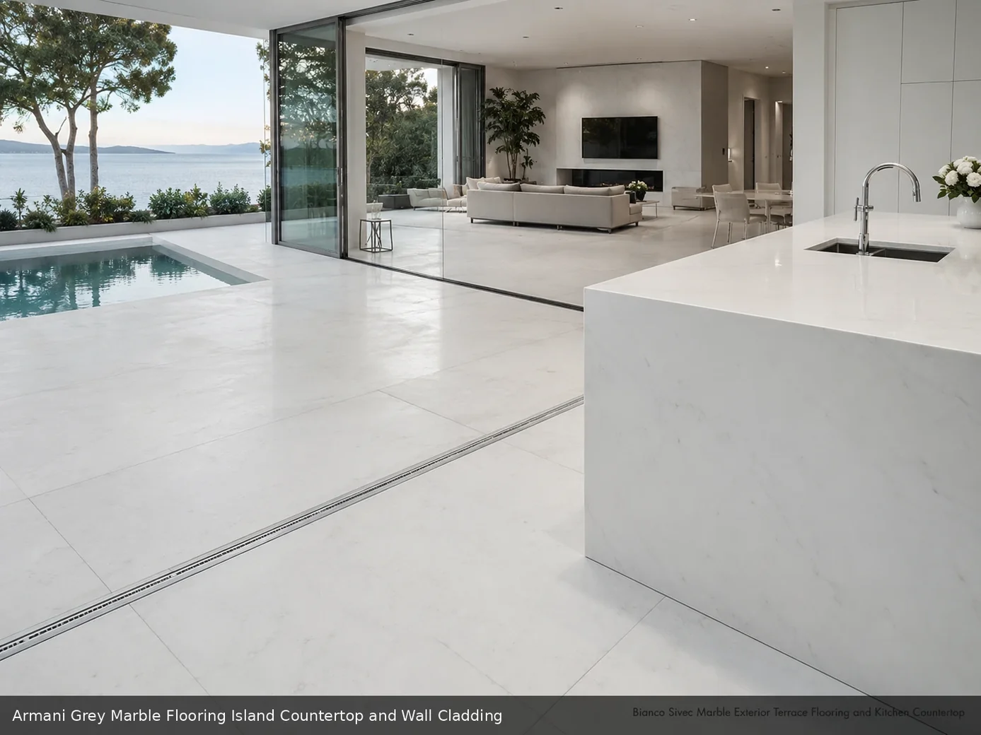 Modern penthouse with deep ash grey stone flooring, polished wall cladding and a precisely fabricated island countertop.