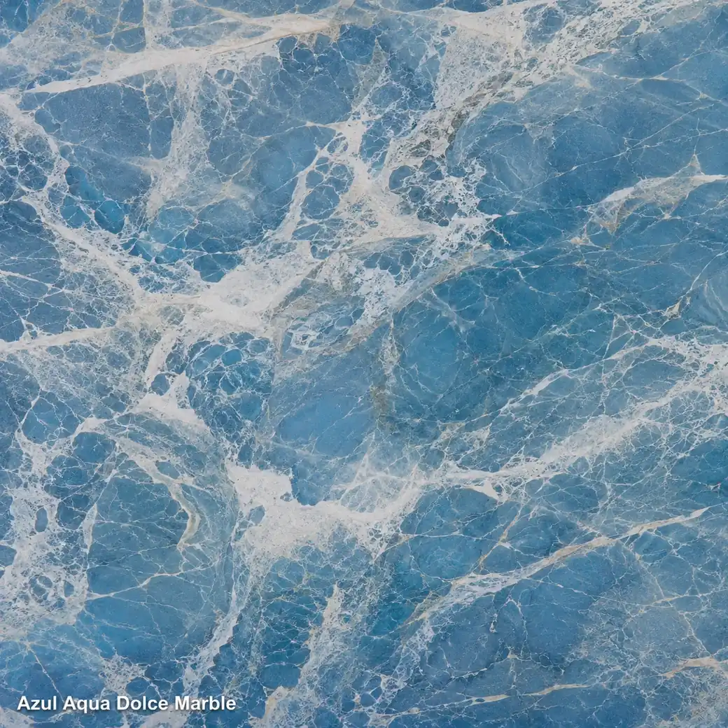 Azul Aqua Dolce Marble with deep ocean blue stone, luminous white currents, icy-grey veins and polished crystalline depth.