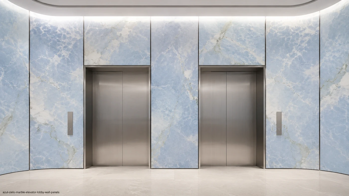 Azul Cielo Marble elevator lobby wall panels with powder-blue stone, soft white clouds and pale green veins.