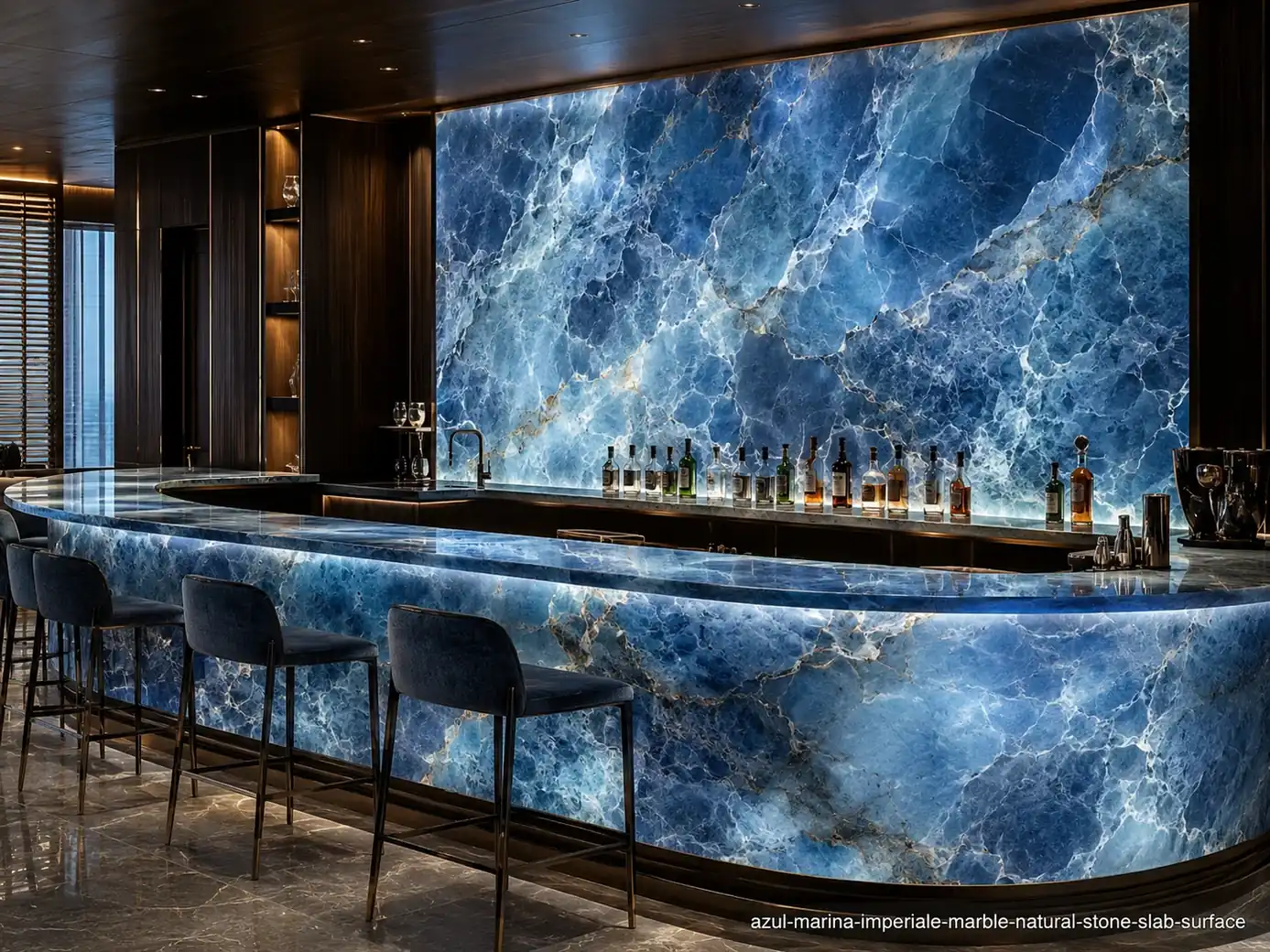 Dramatic white vein pattern across a backlit hotel bar wall and curved counter with rich layered marine blue mineral depth.