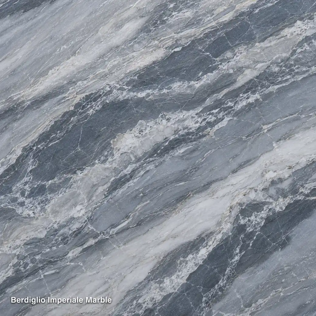 Berdiglio Imperiale Marble with smoky blue grey stone, silver-white ribbons, cloudy layers and a refined polished finish.