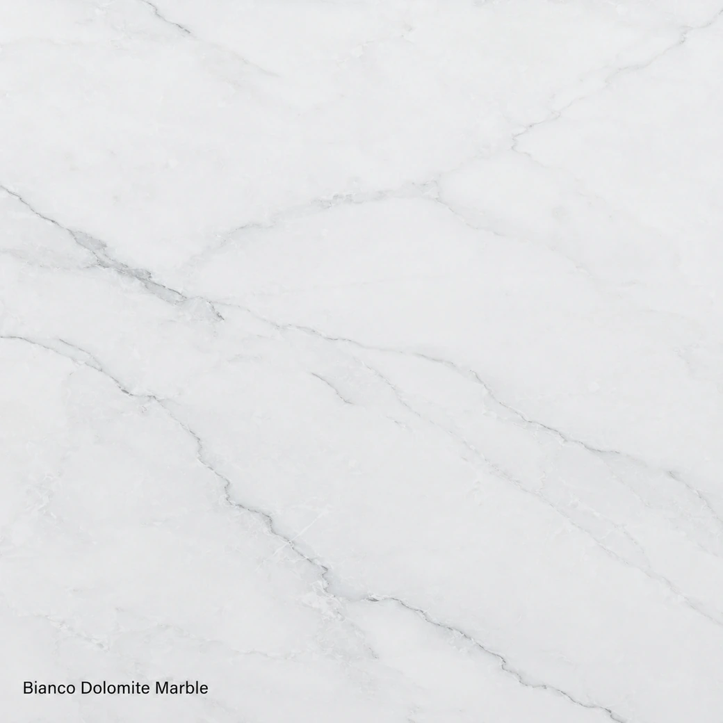 Bianco Dolomite Marble featuring crystalline white dolomitic stone, delicate silver veins and a luminous polished surface.