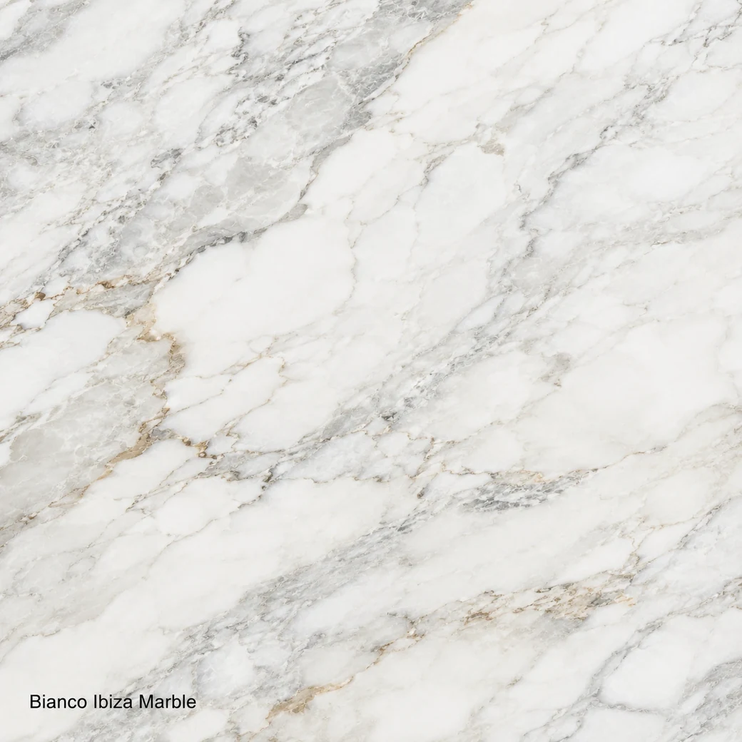 Bianco Ibiza Marble with warm white Mediterranean stone, soft grey clouds, beige-gold traces and a luminous polished finish.