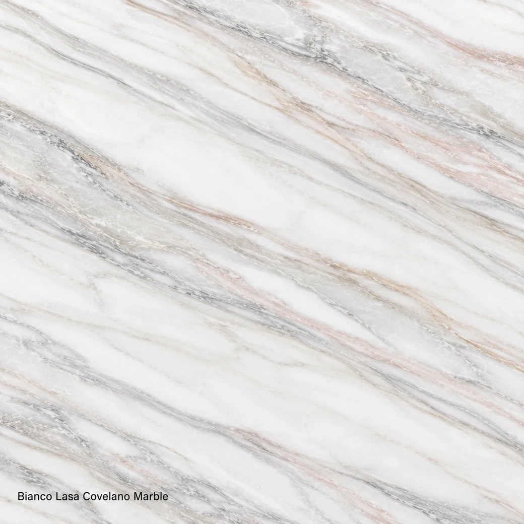 Bianco Lasa Covelano Marble with alpine white crystalline slab, silver-blue veins, blush accents and luminous polished depth.