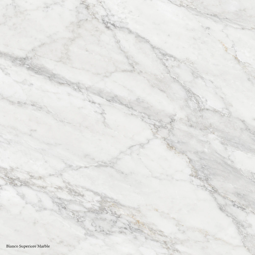 Bianco Superiore Marble featuring superior grade white stone, silver-grey wisps, rare beige accents and a polished finish.