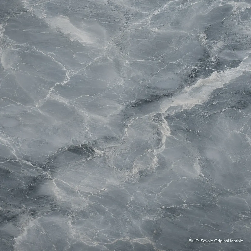 Blu Di Savoie Original Marble with cool blue grey stone, ivory veins, smoky graphite clouds and a refined polished surface.