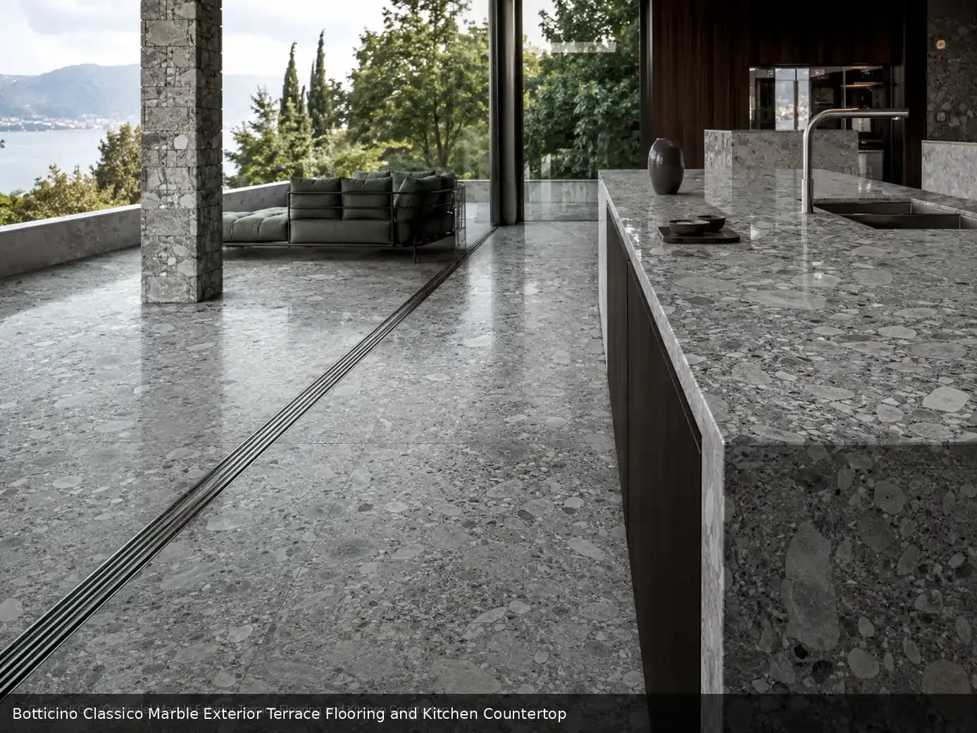 polished traditional interior slab across terrace floor and kitchen countertop, with natural veining in a refined interior.