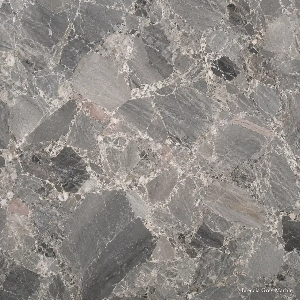 Breccia Grey Marble with fragmented grey natural stone, ivory outlines, charcoal seams, blush traces and polished depth.