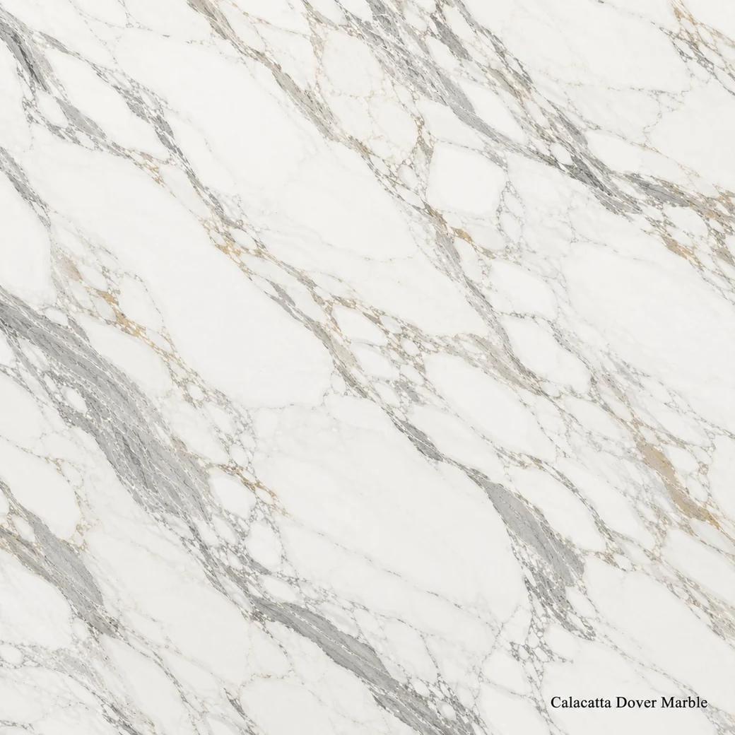 Calacatta Dover Marble with crisp white dramatic vein stone, flowing grey ribbons, ivory clouds and warm mineral accents.