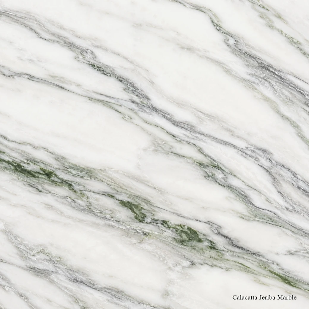 Calacatta Jeriba Marble with luminous white exotic stone, fine grey-green veins and a bright polished crystalline finish.