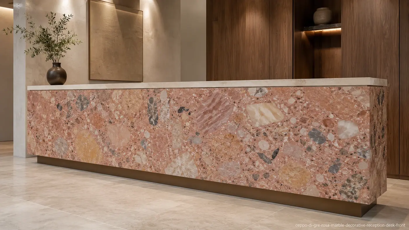 Ceppo di Gre Rosa Marble reception desk front with coral stone and cream, mustard, blue-grey and charcoal fragments.