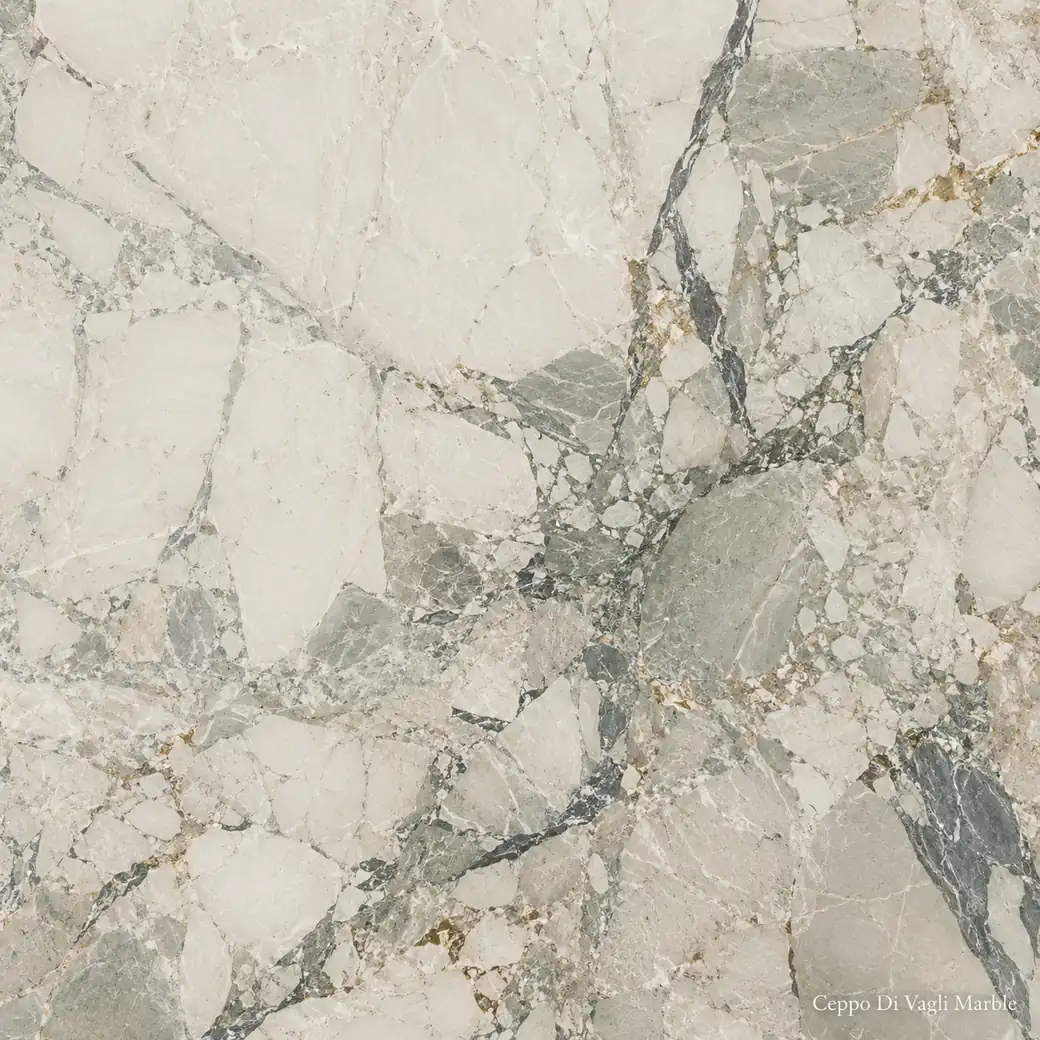 Ceppo Di Vagli Marble with warm brown aggregate stone, creamy fragments, grey-green seams and restrained warm gold movement.
