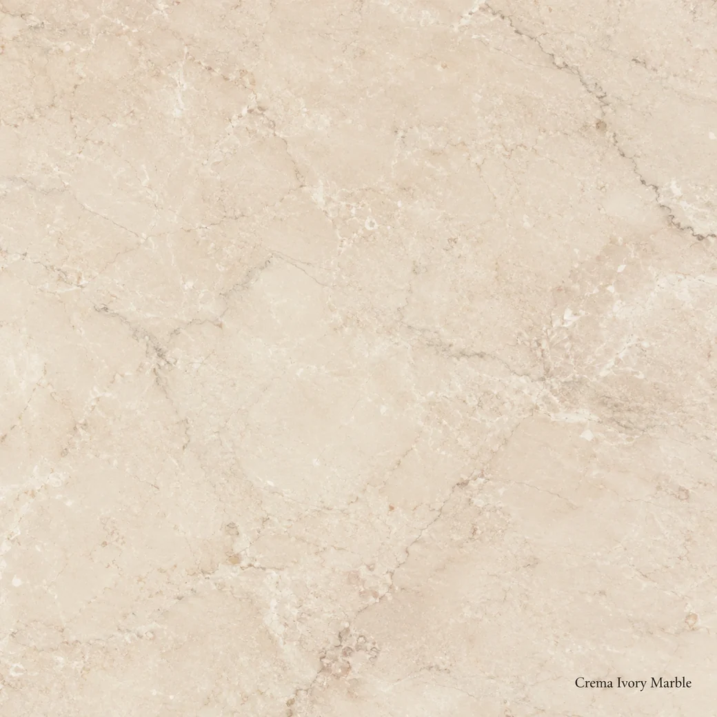 Crema Ivory Marble with warm ivory natural stone, soft taupe veins, pale pink undertones and a warm polished creamy finish.