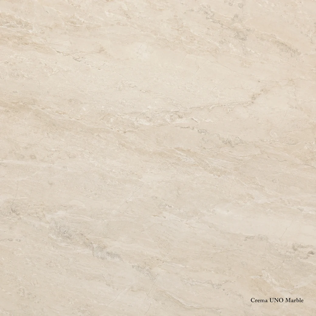 Crema UNO Marble with uniform warm cream stone, beige clouding, pale grey veins and smooth natural luminous polished depth.