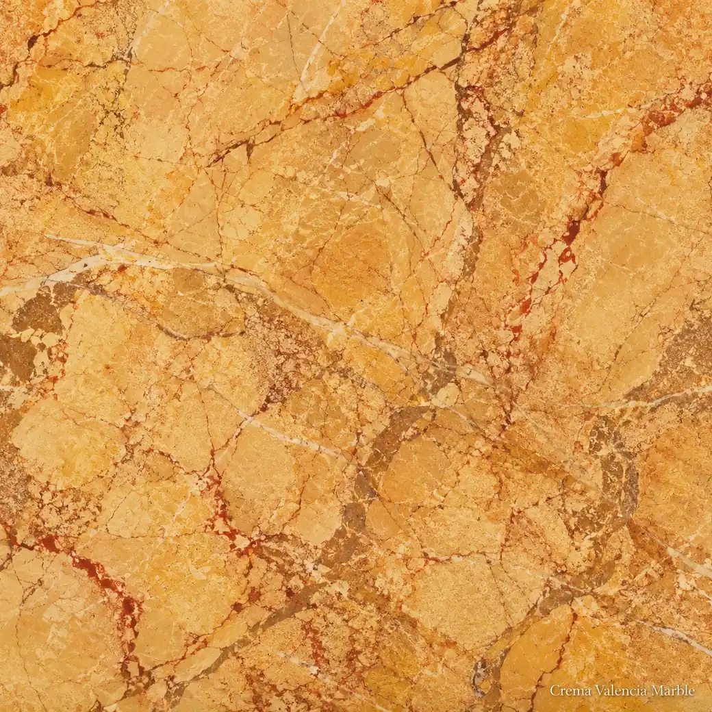 Crema Valencia Marble with warm golden cream stone, rust-red veins, ochre clouds and a vivid rich polished mineral finish.
