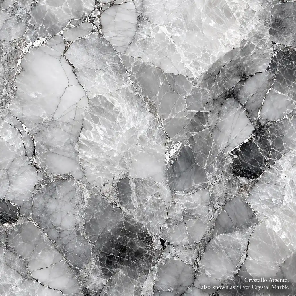Crystallo Argento Marble with translucent silver crystalline stone, smoky graphite clusters and luminous polished depth.