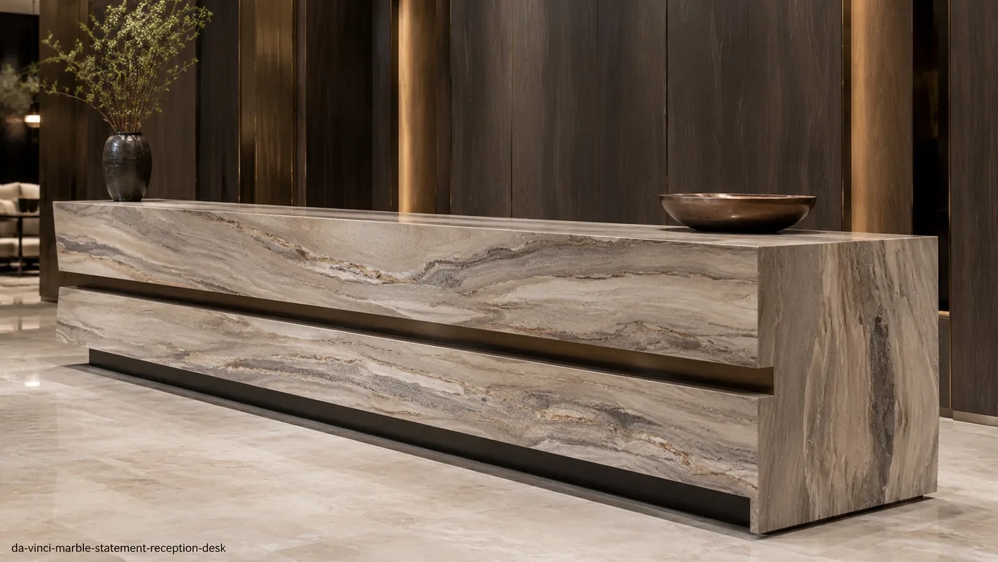 Da Vinci Marble statement reception desk with beige-taupe stone and strong directional grey and gold streaks.