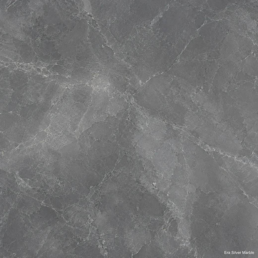 Era Silver Marble with cool silver grey stone, faint pale veins, cloudy graphite tones and a subtle polished mineral finish.