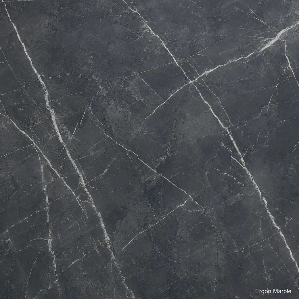 Ergon Marble with structured architectural stone, pale linear veins, graphite fields and a contemporary polished finish.