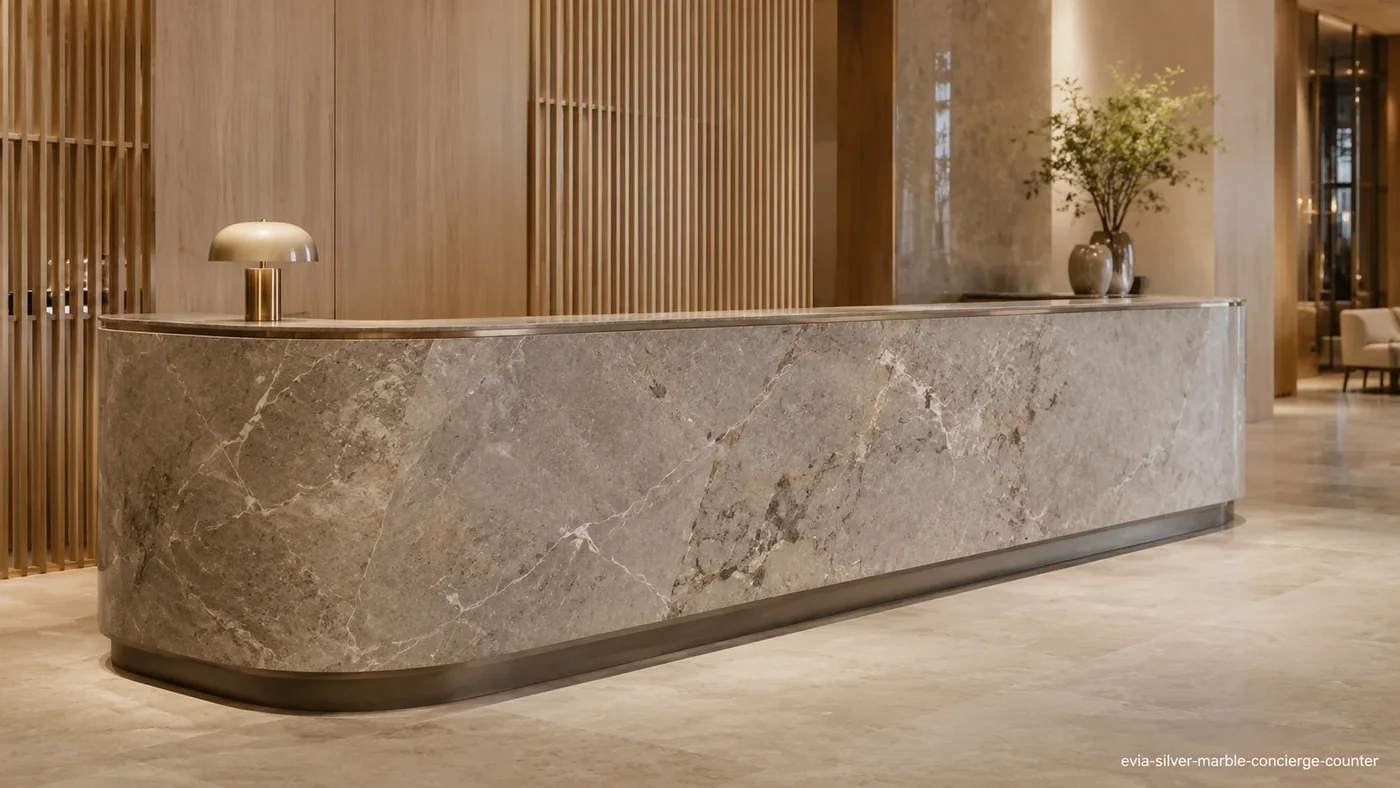 Evia Silver Marble concierge counter with silver-grey stone, fine white veins and warm taupe undertones.
