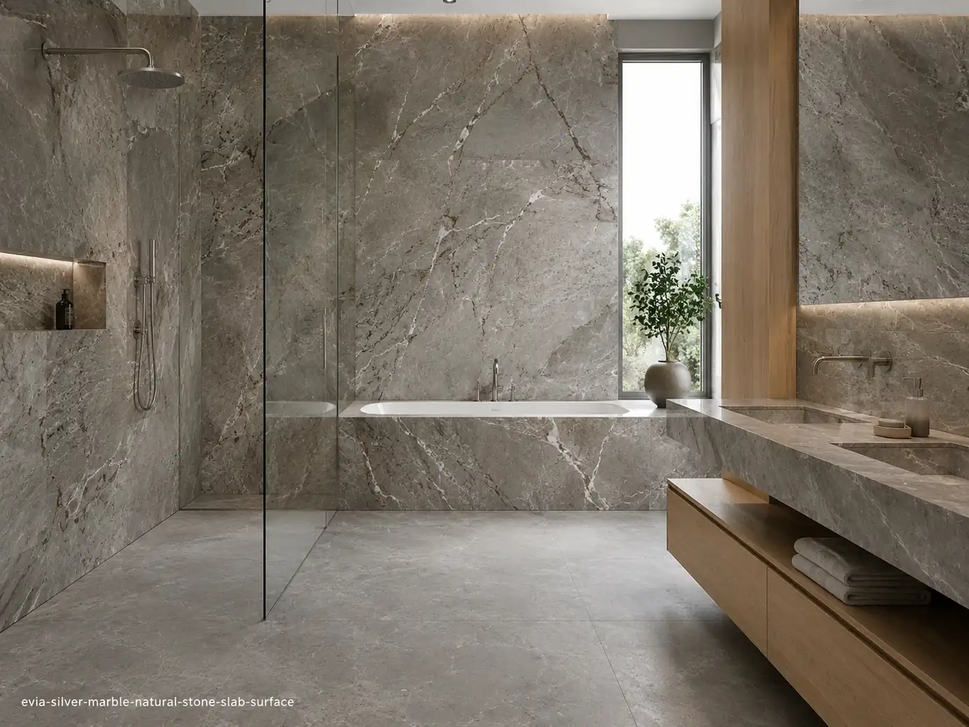 Cool toned architectural slab on shower walls, floating vanity, bathtub surround and flooring with silver and taupe movement.