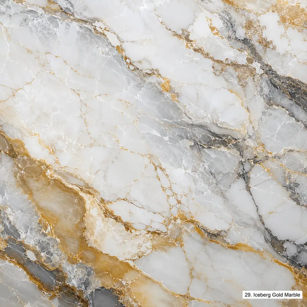 Iceberg Gold Marble with icy white stone with gold movement, amber ribbons, grey fractures and luminous polished finish.