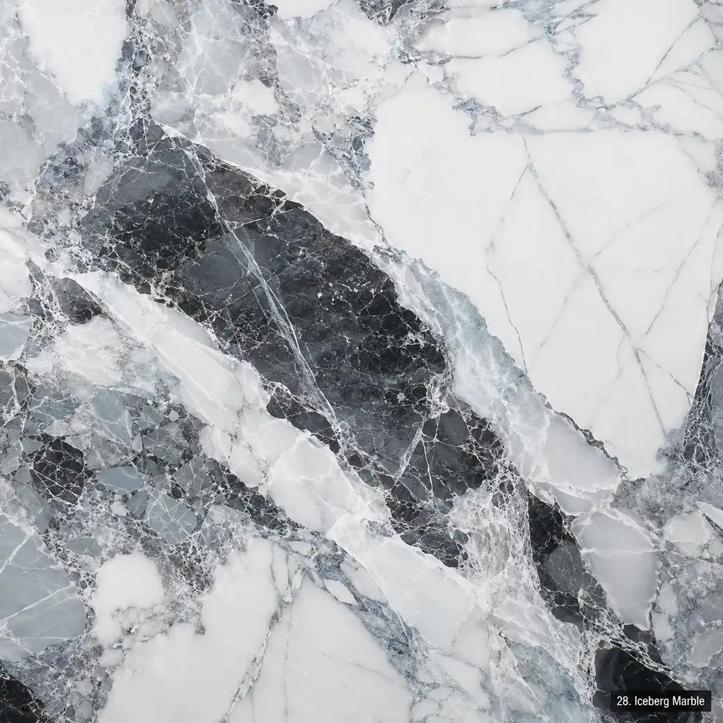 Iceberg Marble with icy white crystalline stone, charcoal masses, silver fractures and a dramatic polished glacial finish.