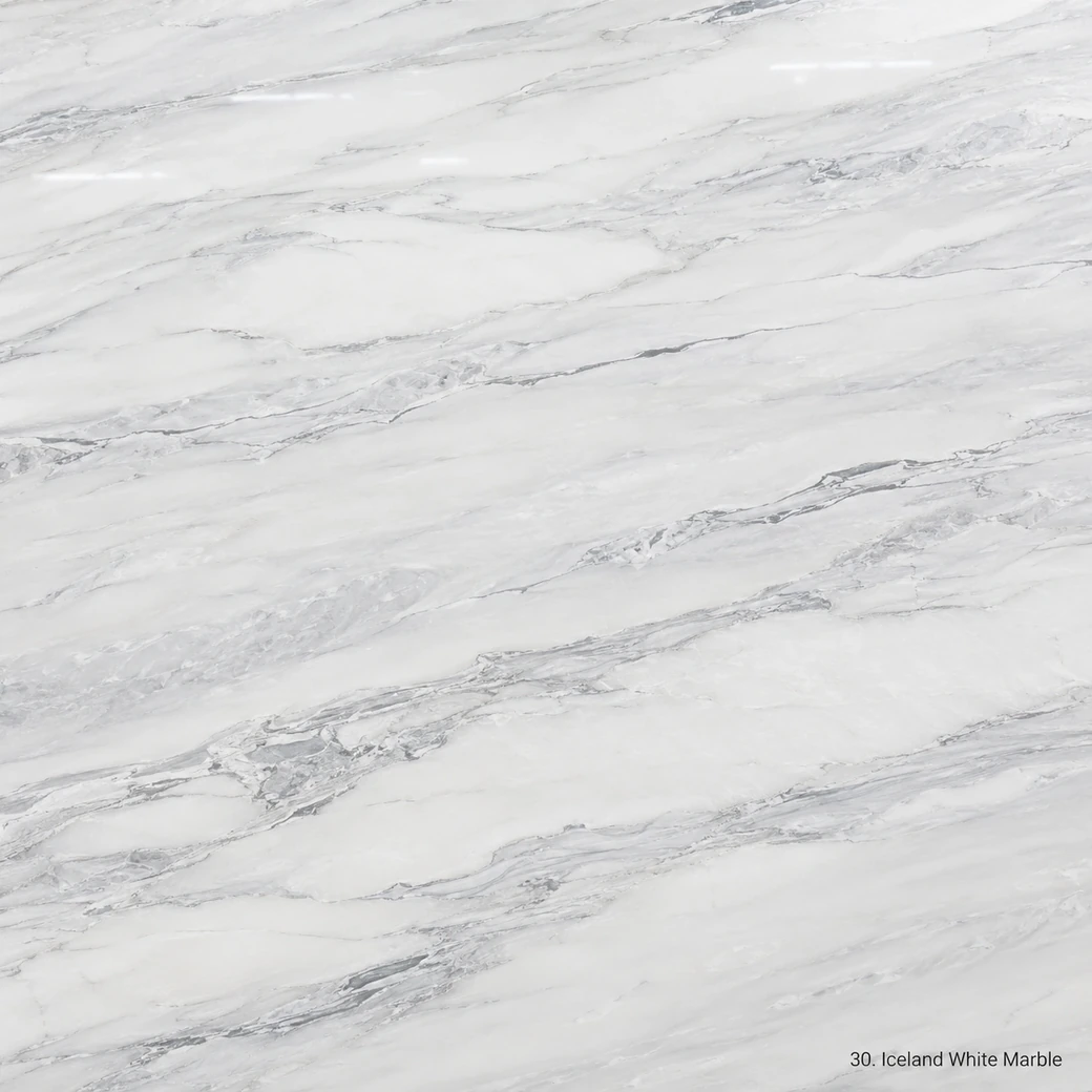 Iceland White Marble with frosted white linear stone, silver-grey bands, fine fractures and a crisp polished icy finish.