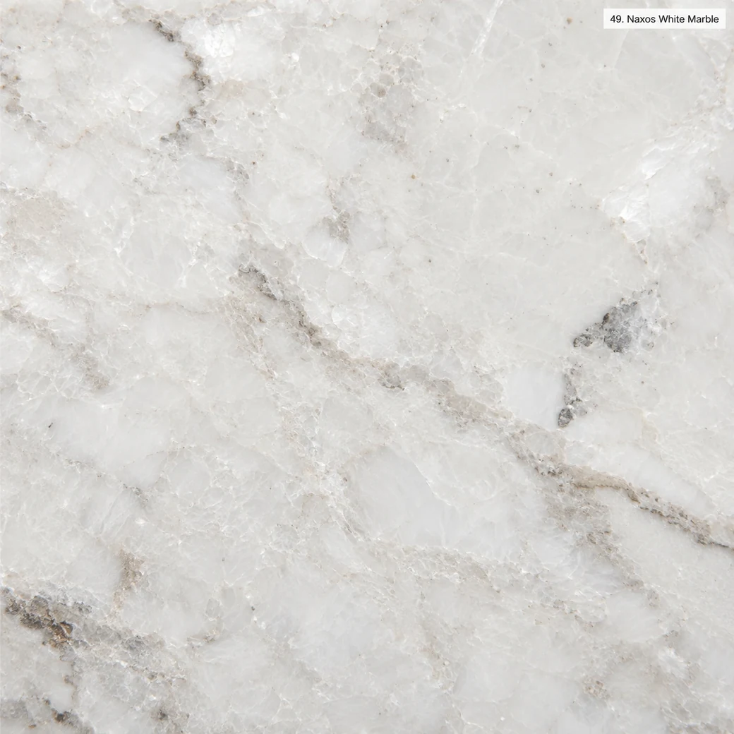 Naxos White Marble with crystalline Greek white stone, large calcite grains, pale-grey clouds and a bright polished finish.