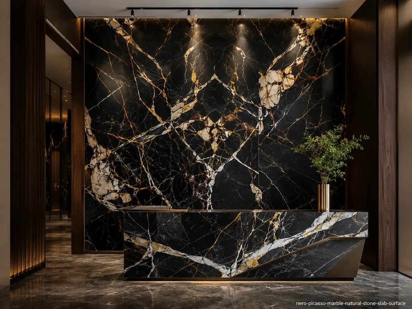 Artistic monochrome luxury slab on a hotel lobby wall and reception counter with black, white, gold, rust and cream movement.