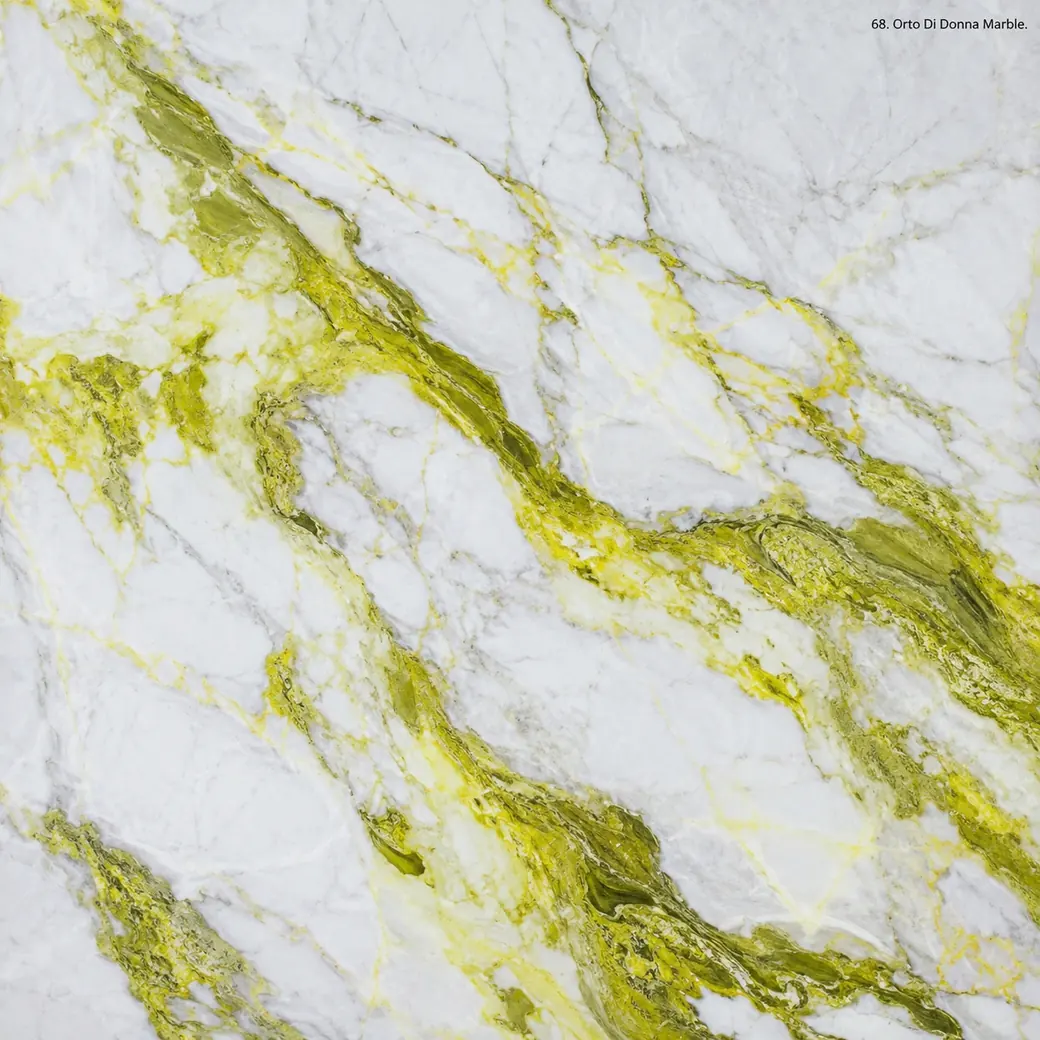 Orto Di Donna Marble with soft white grey veined stone, lemon-yellow ribbons, olive threads and luminous polished depth.