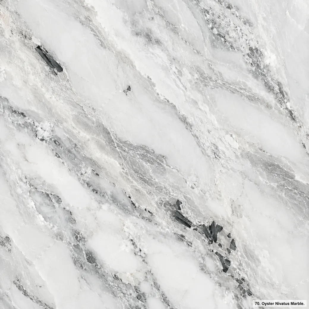 Oyster Nivatus Marble with frosted pearl white stone, silver-grey waves, graphite fragments and luminous polished depth.
