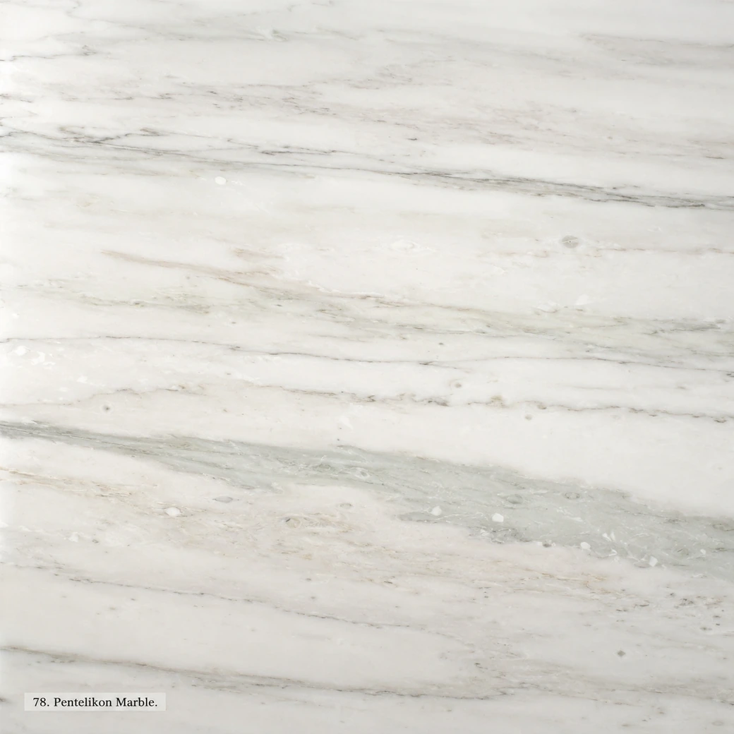 Pentelikon Marble with historic Greek white stone, soft green-grey bands, warm undertones and a refined polished finish.