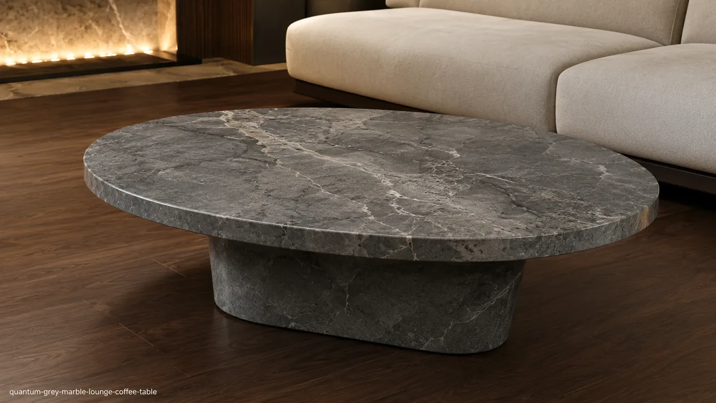 Quantum Grey Marble coffee table with graphite-grey stone, pale calcite lines and a sculptural curved pedestal.