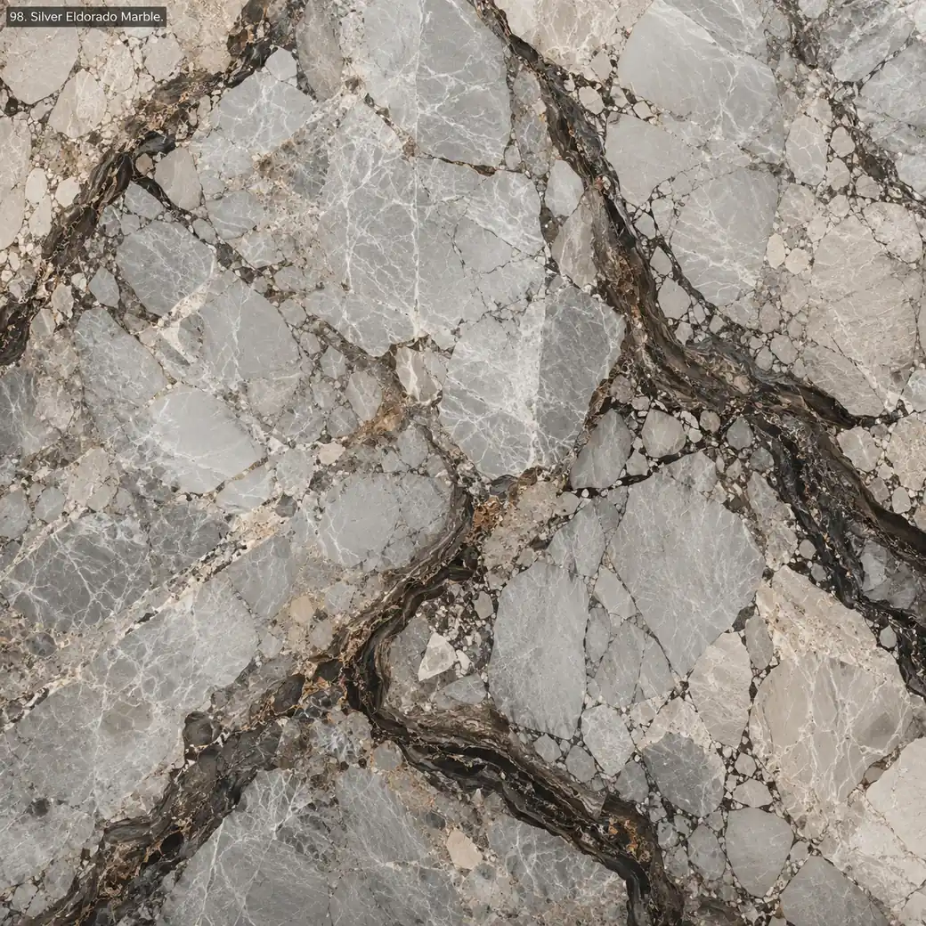 Silver Eldorado Marble with luminous silver grey stone, dark fault veins, pale islands and rich polished crystalline depth.