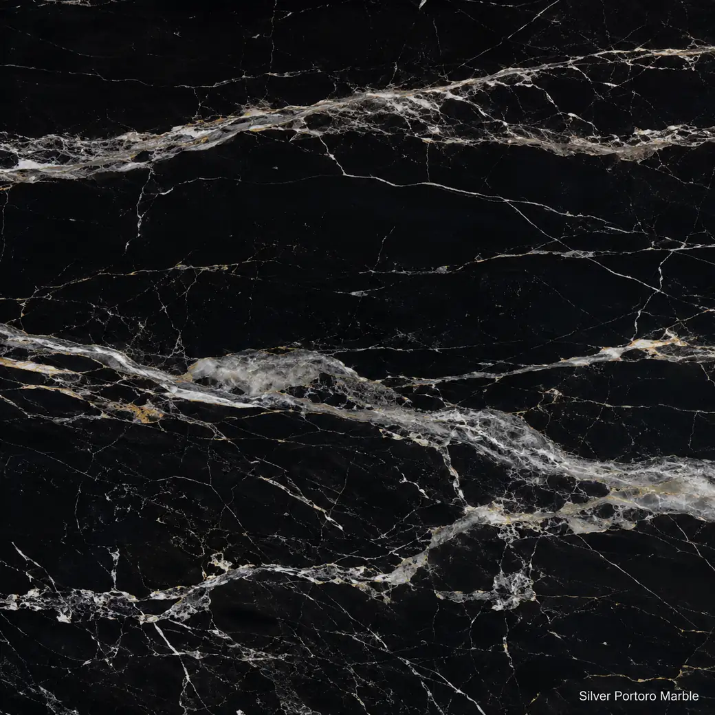 Silver Portoro Marble with black stone with silver veining, pale calcite ribbons, charcoal depth and polished mirror finish.