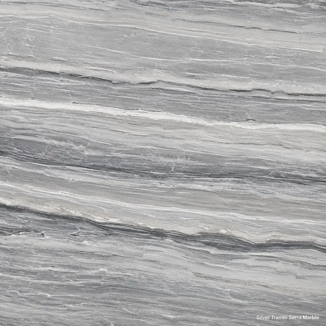 Silver Trambi Serra Marble with cloudy silver grey stone, pearl bands, graphite lines and a refined polished layered finish.