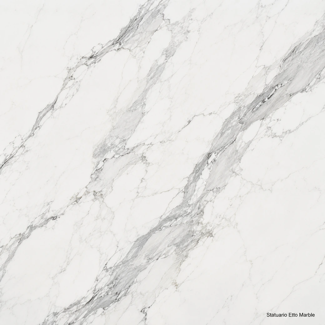 Statuario Etto Marble with crisp white dramatic stone, silver brushstroke veins, grey clouds and a bright polished finish.