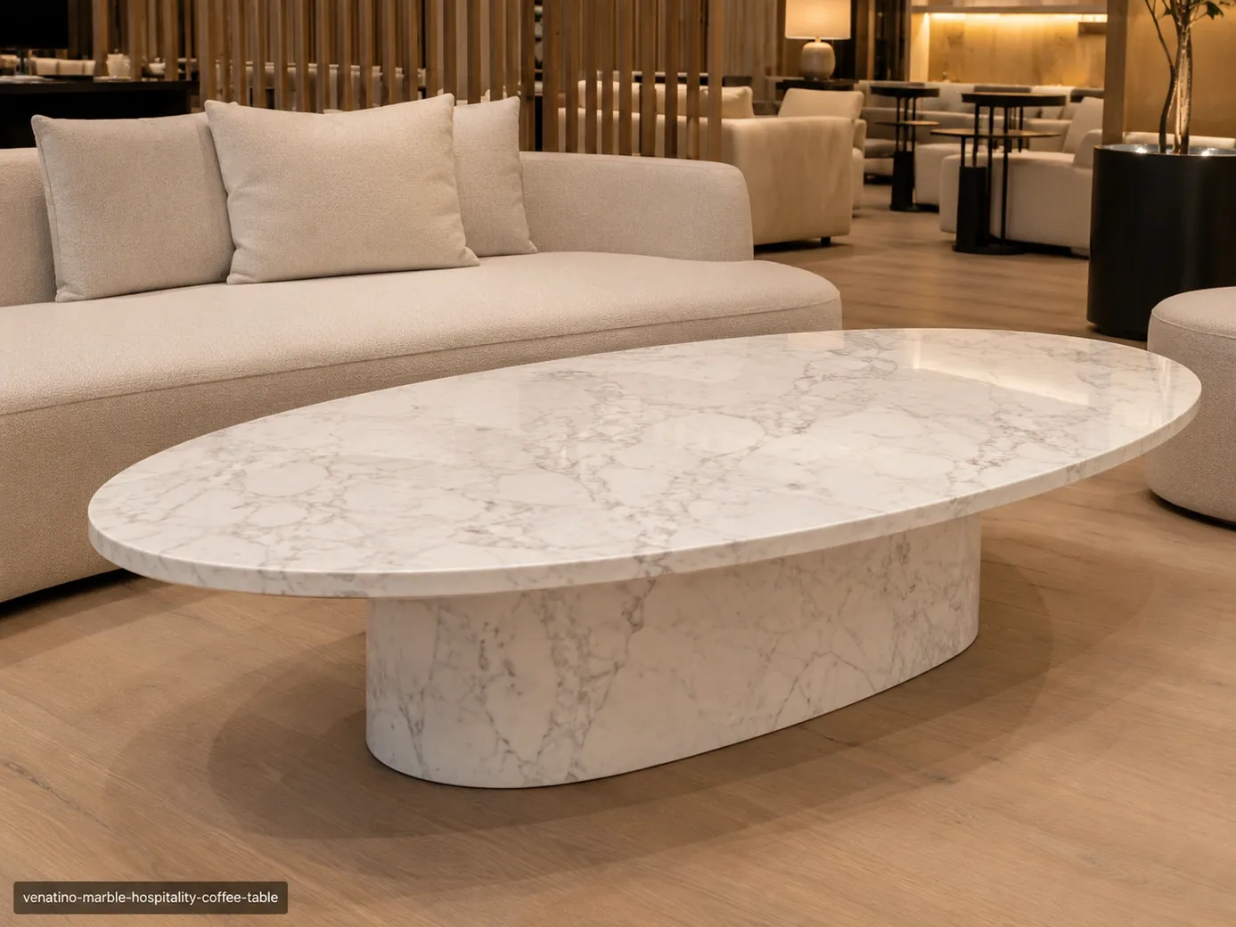 Venatino Marble coffee table with pearl-white stone, fine silver-grey veins and a softly curved pedestal.
