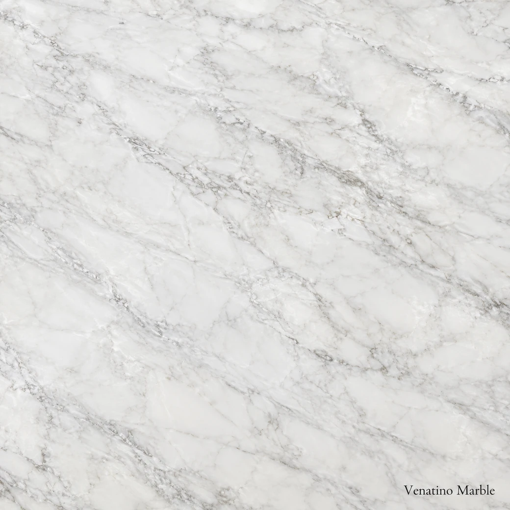 Venatino Marble with bright white finely veined stone, silver threads, soft grey clouds and a pearlescent polished finish.