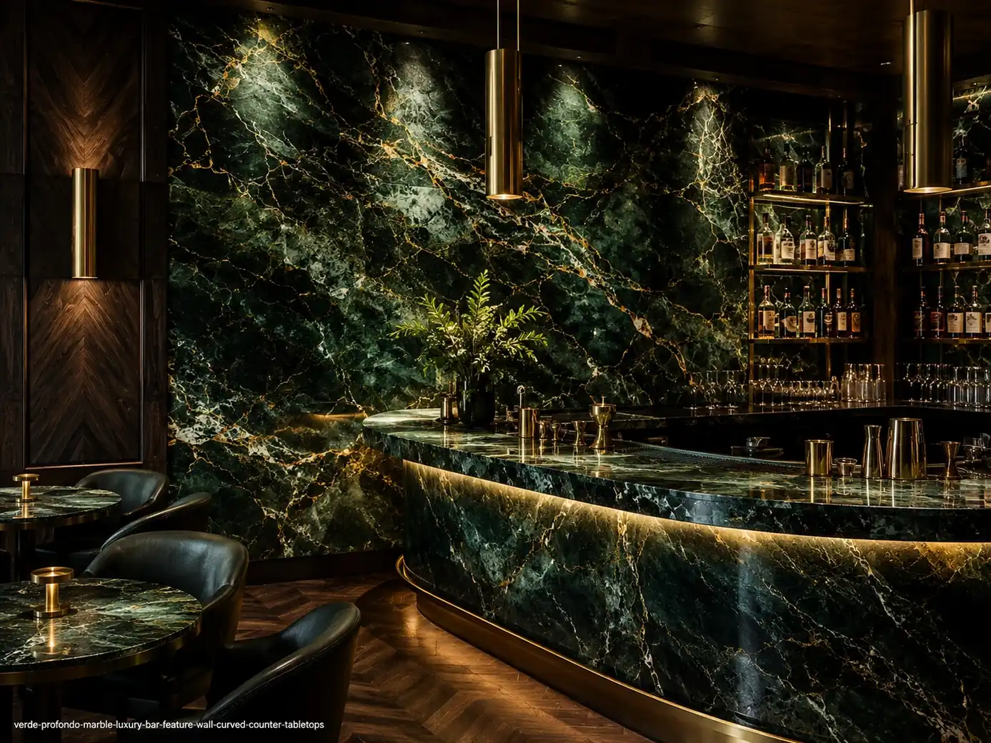 Polished immersive architectural slab on a bar wall, curved counter and tabletops with emerald, olive and golden threads.