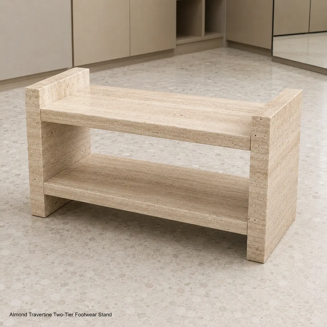 Almond travertine shoe rack on pale terrazzo, high front view showing two empty shelves and stone side panels.