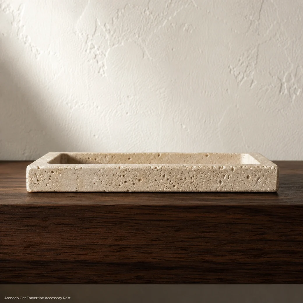 Low side-profile oat beige travertine tray rest with recessed center and sandy Arenado texture.