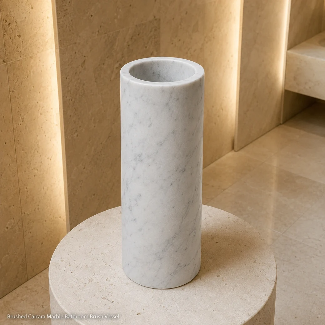 Cool white Carrara brush vessel on pale stone plinth, high view highlighting rim thickness and fine veining.