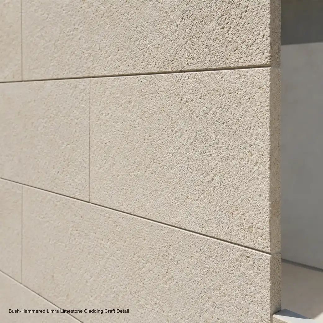 Bush-hammered Limra limestone cladding showing ivory-cream texture, cut edges and stone craftsmanship