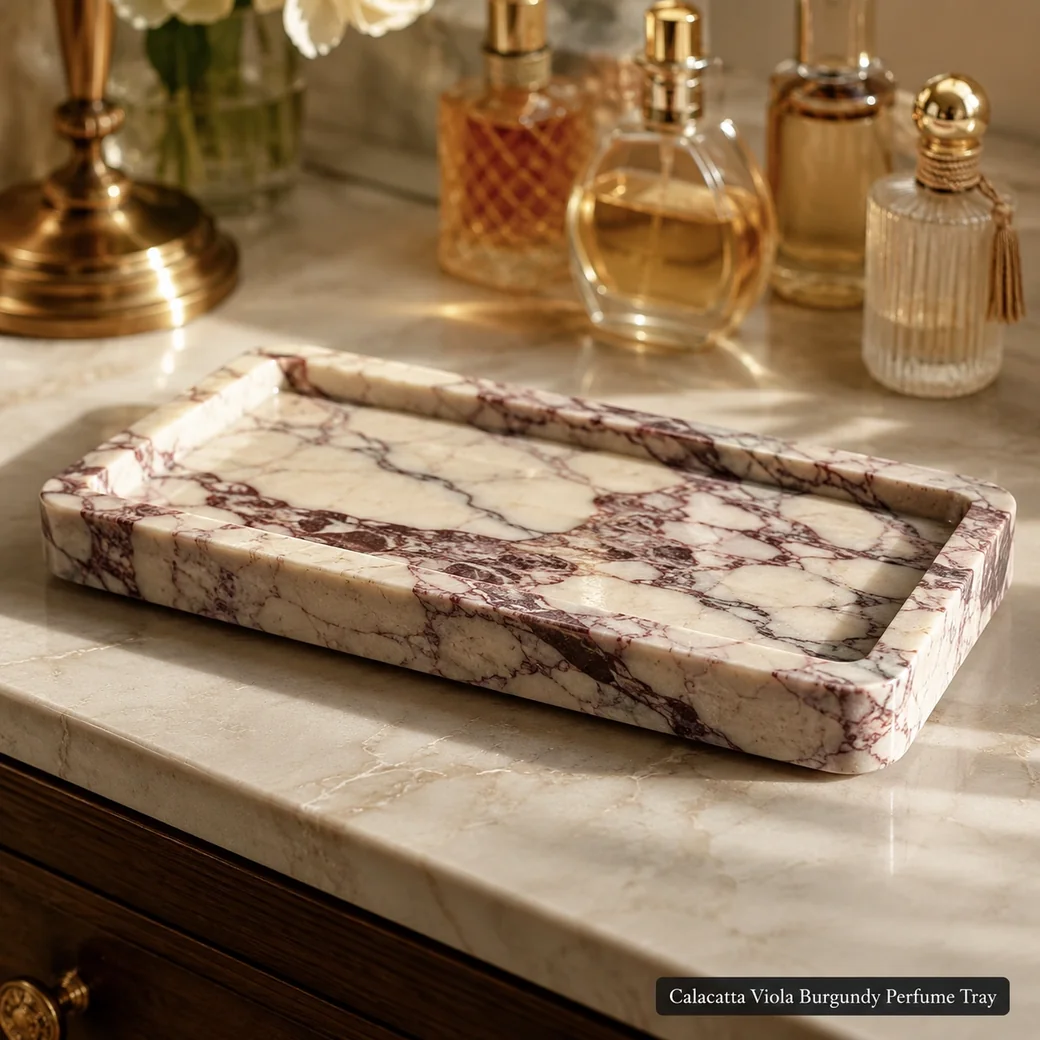 Calacatta Viola perfume tray in cream-white marble with burgundy-grey veining and hand-polished finish.