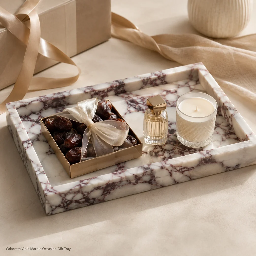 Brushed Calacatta Viola gift tray styled for an occasion with creamy white marble and burgundy movement